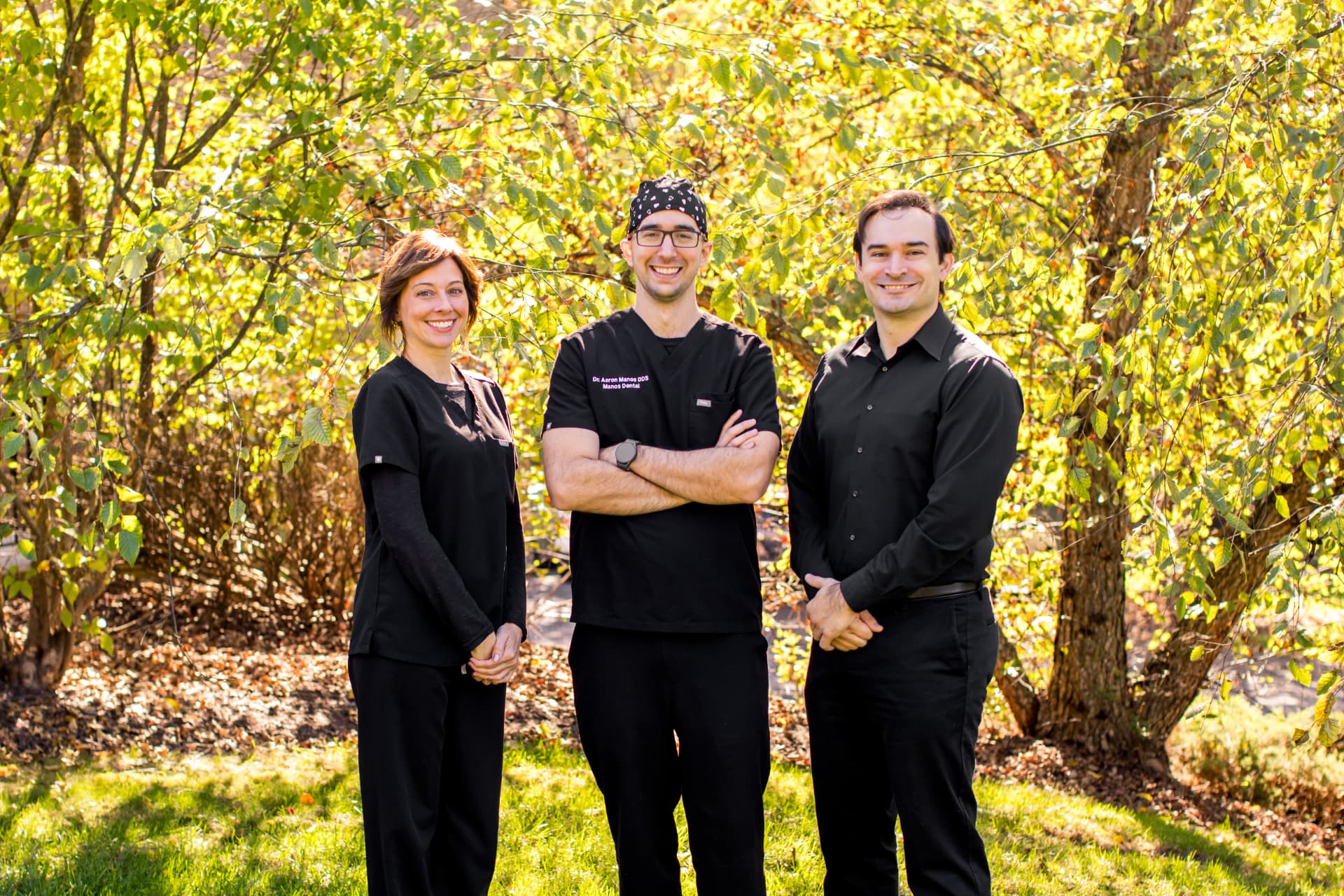 Dr. Aaron Manos and the Manos Dental team outdoors in McCandless, PA